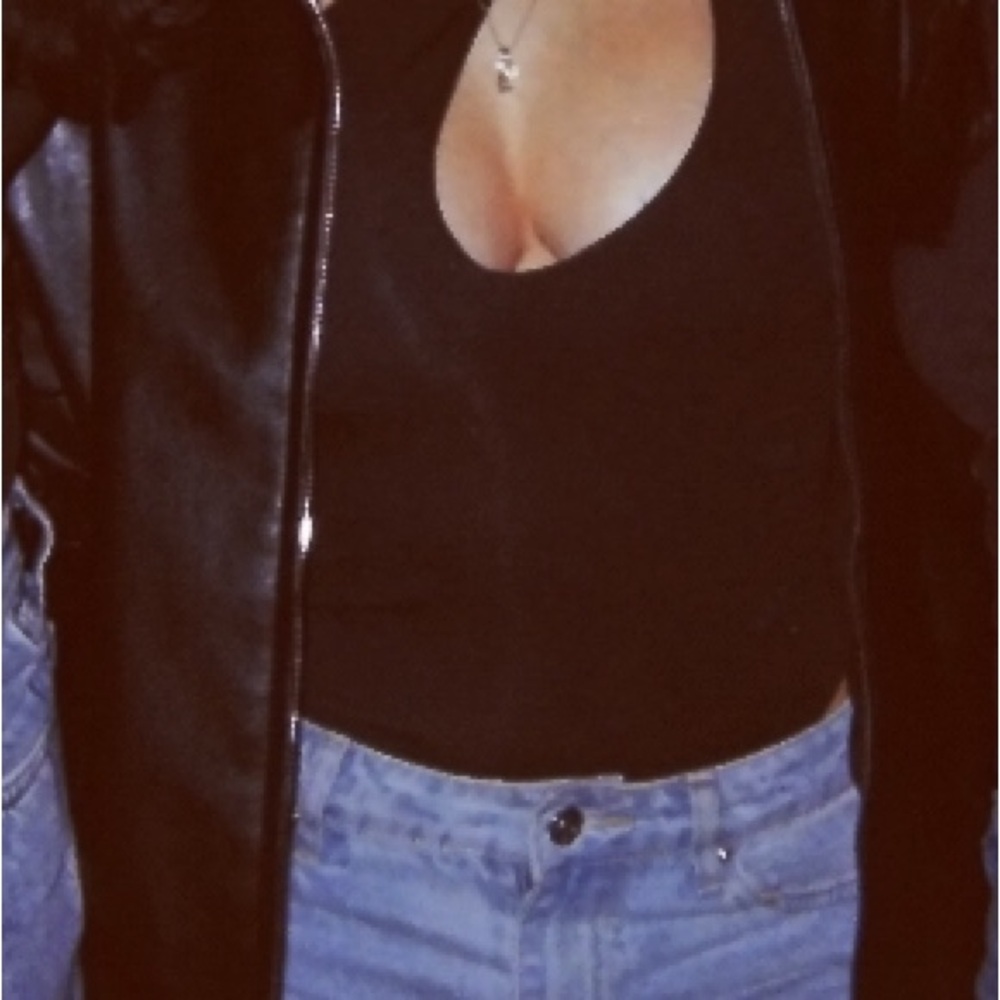 Black Leather Jacket and Blue Jeans